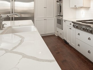 quartz countertop in kitchen with white cabinets